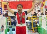 Photo of Winda Wahyuni Ukir Sejarah di Malaysia, Sabet Emas dan Gelar Petinju Terbaik Wanita