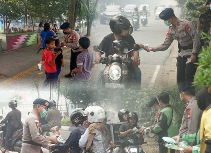 Photo of Peduli Kesehatan Warga, Brimob Kalbar Bagikan Masker di Tengah Kabut Asap Karhutla
